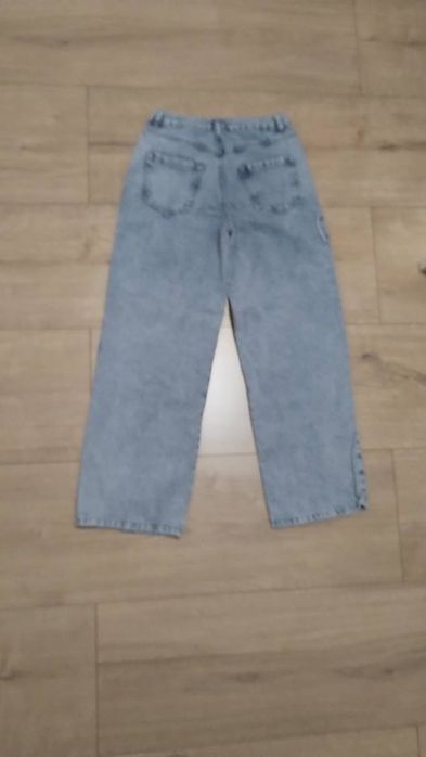 Jeansy  z kokardą rozm 158