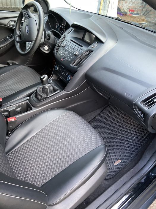 Ford Focus 2015 VIN 1FADP3E20FL265460 фото оголошення 19 з 23