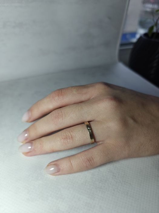 Срібне кільце з золотом 875° та трьома білими фіанітами