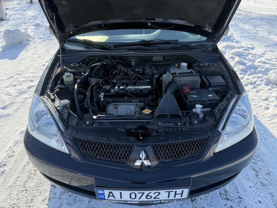 Продам  Mitsubishi Lancer