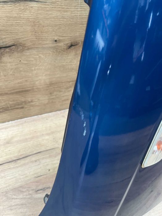 Błotnik przedni prawy Bmw E46 lift kolor topas blau metalic