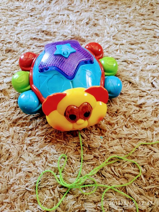 Игрушка каталка божья коровка