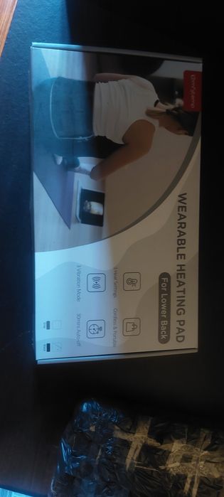 Cinta lombar aquece e faz massagem