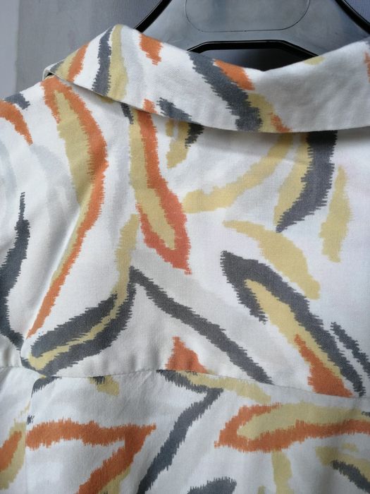 Camisa com riscas estilo zebra em viscose- MODELO ÚNICO ( ENVIO GRÁTIS