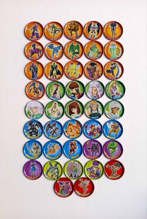 42 tazos da série Yu Gi Oh! metal tazos entre os números 1 e o 49 se encontrando em muito bom estado 

Em