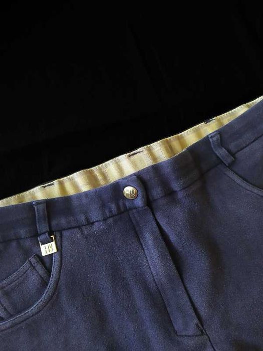 Materiałowe bryczesy L 40 z lejem damskie do jazdy konnej granatowe