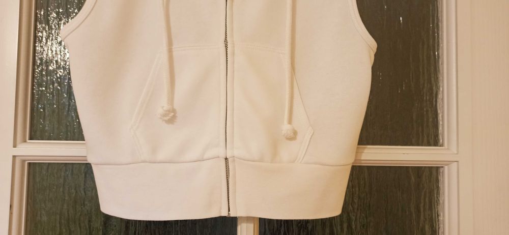 Sprzedam dresową, dziewczęcą,sportową  białą kamizelkę H & M