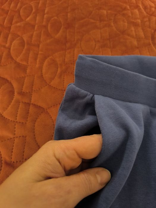 Bawełniane niebieskie dziewczęce spodnie dresowe 4F rozm 158