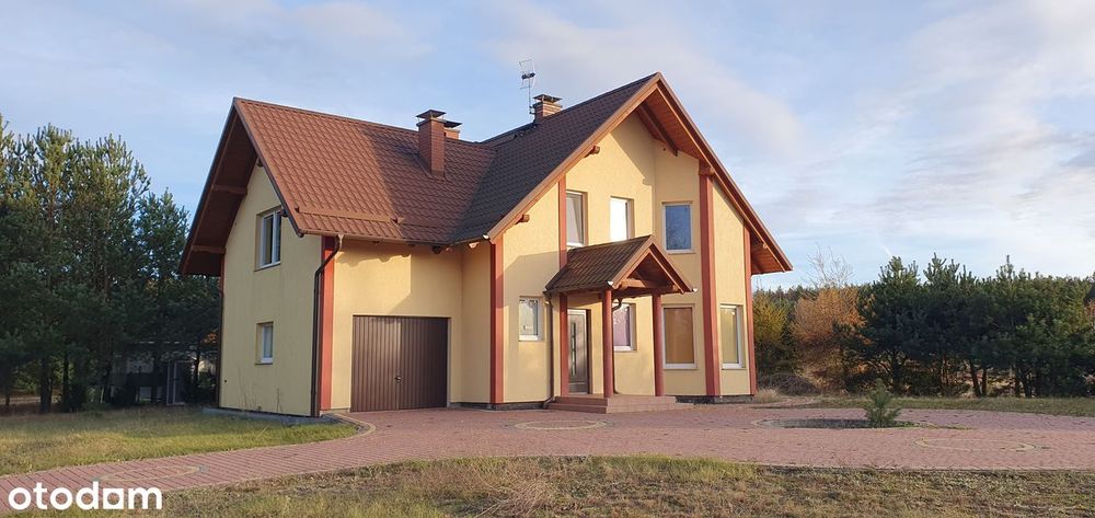 Dom pośród jezior i lasów
