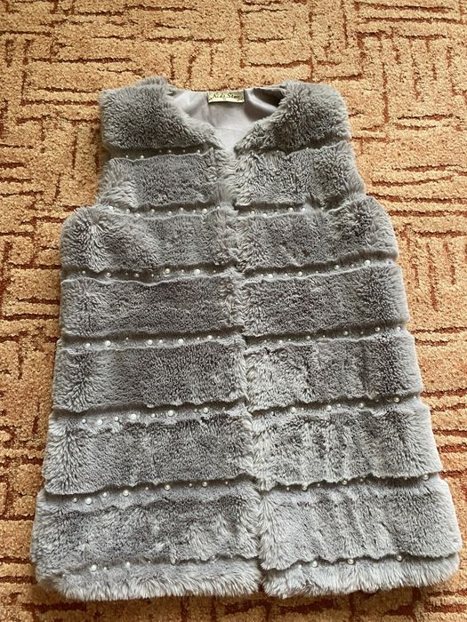 Безрукавка для дівчинки