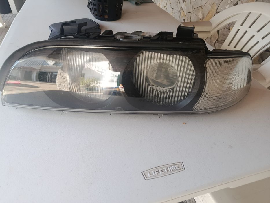 Farol BMW E39 Esq.