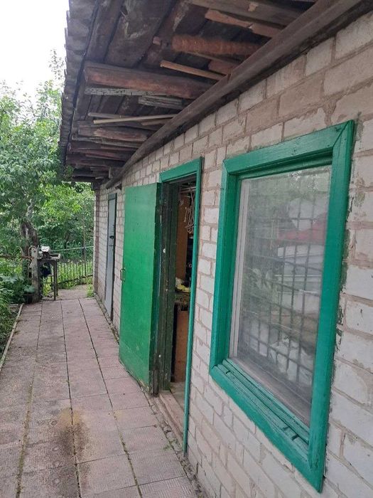 Продам 1/2 дома на Салтовке в районе парка Победы.