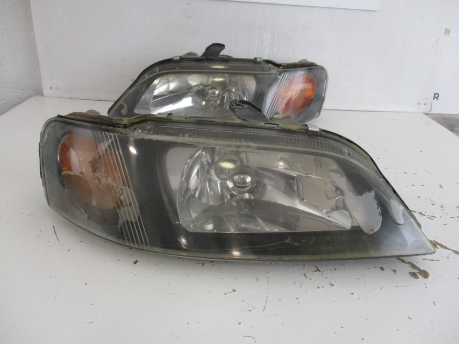farol Direito mitsubishi space star 2003