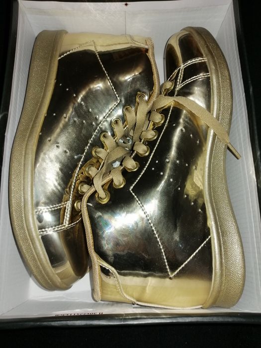 Sapatilhas douradas