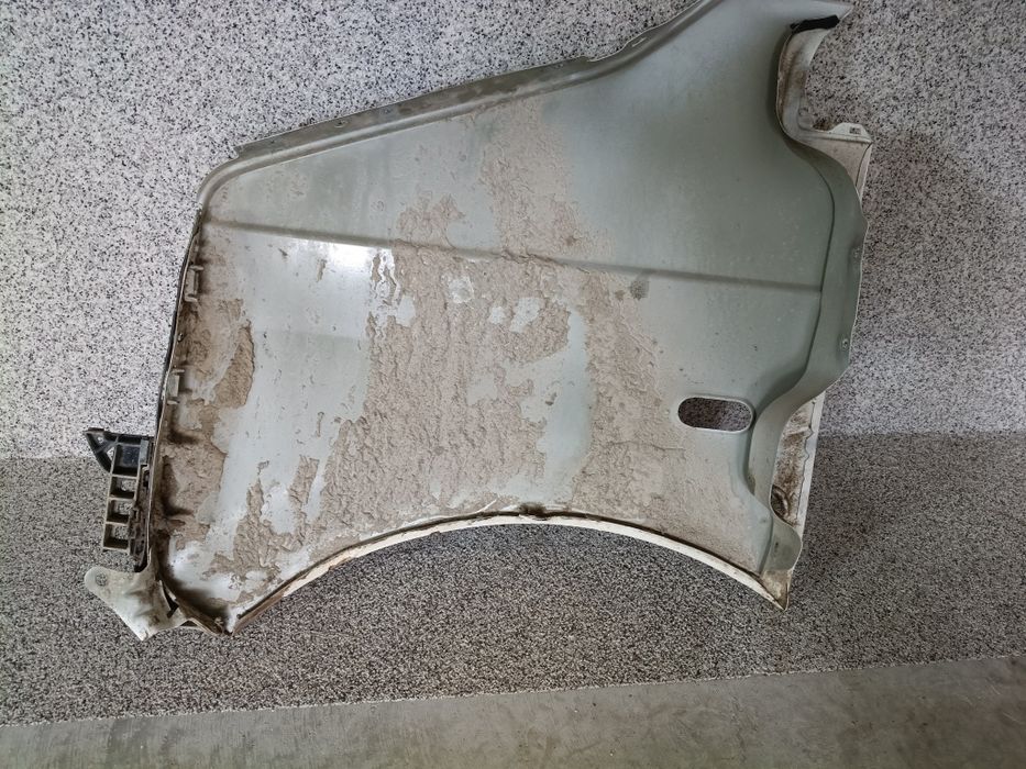 Błotnik prawy VW transporter T5 brak kodu lakieru