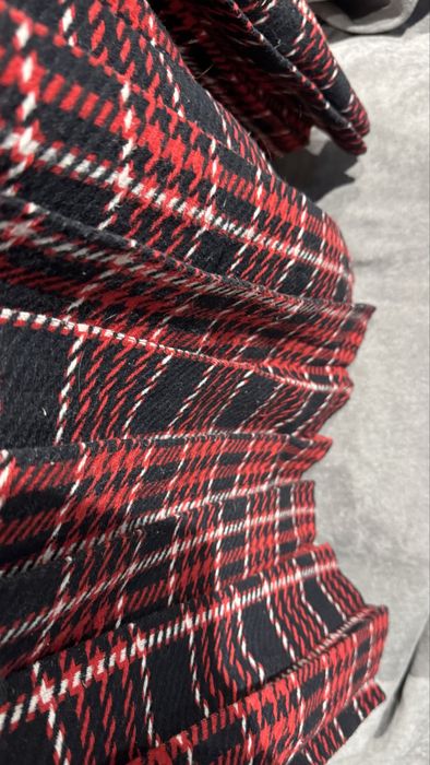 Тепла плісована міді спідниця з вовною