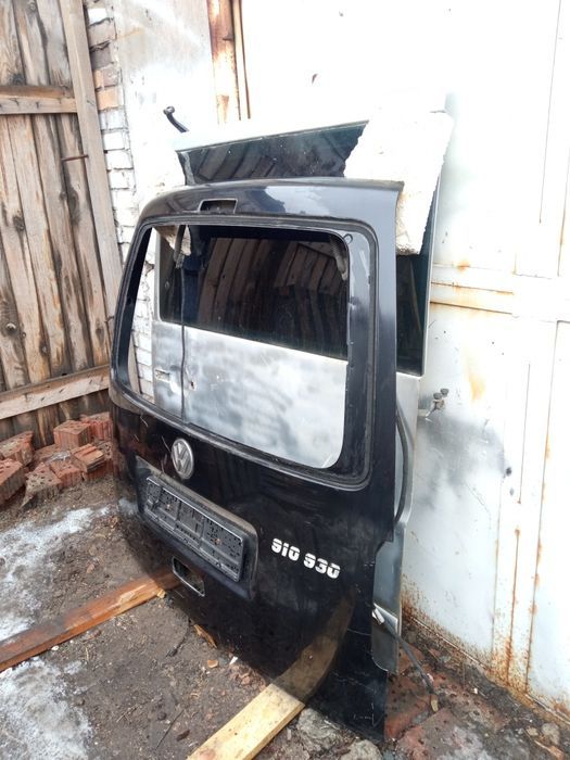 Дверь задняя ляда Volkswagen Caddy 2003-2014 черный цвет без стекла