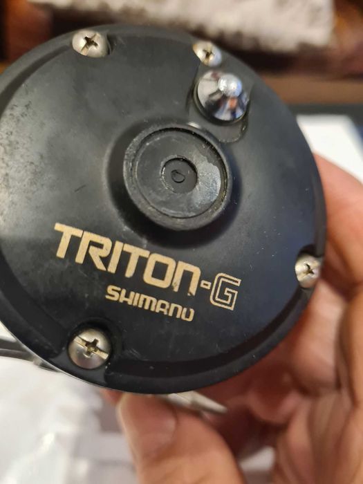 kołowrotek shimano triton 100-G
