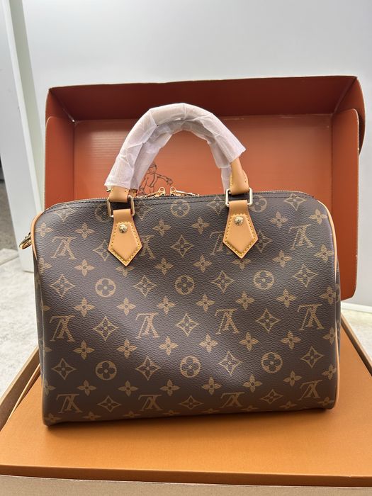Сумочка в стилі  LV
