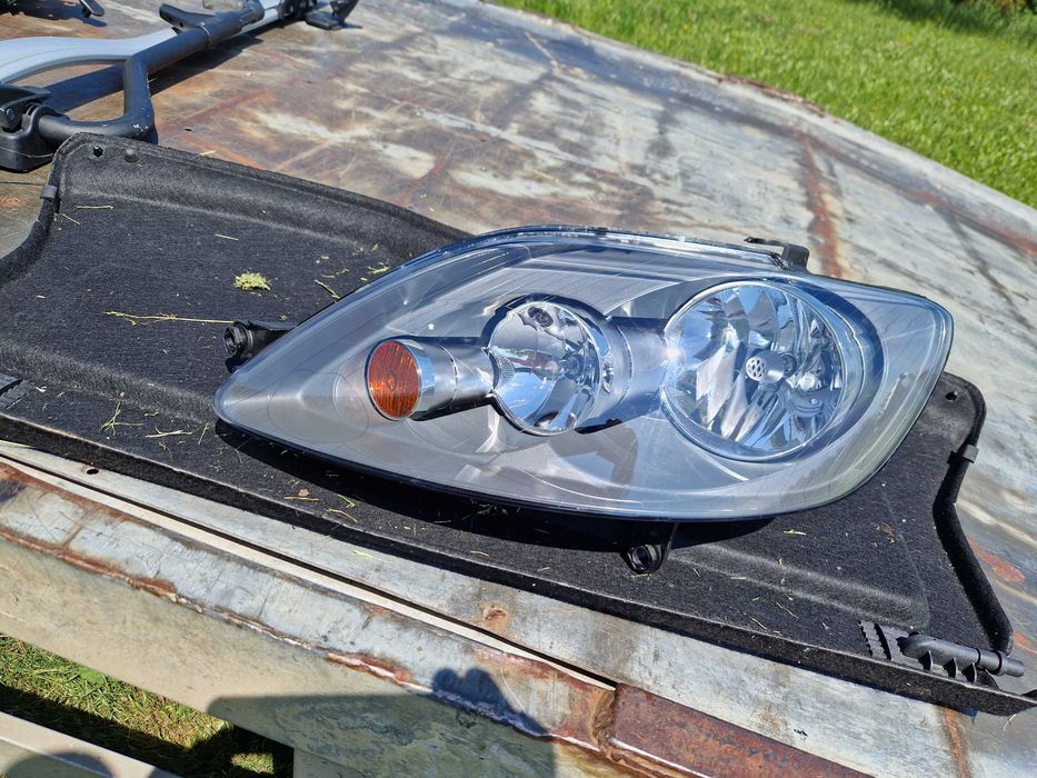 VW Golf + PLUS reflektor HELLA NOWY ORG