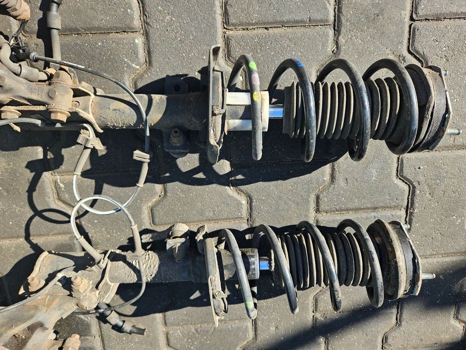 Ford Fiesta MK7 mcpherson amortyzator sprężyna przód przedni prawy lewy 1.6 TDCI