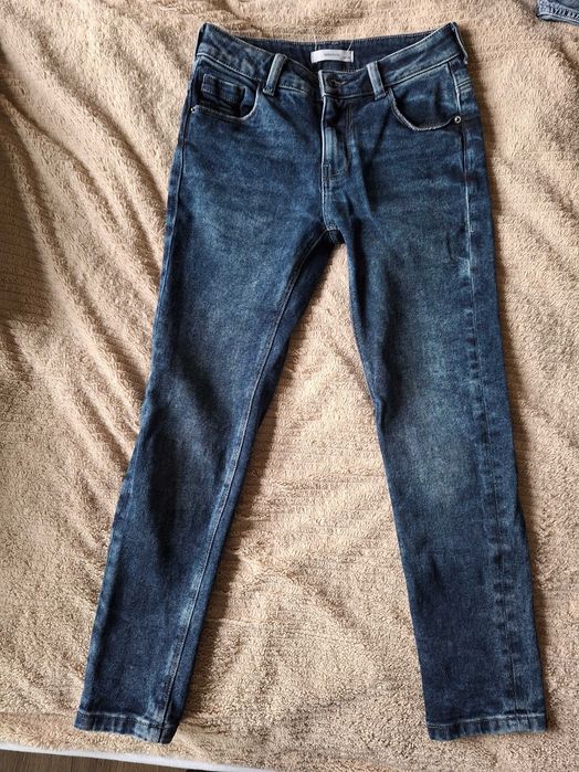 Spodnie jeansowe Reserved rozm. 140