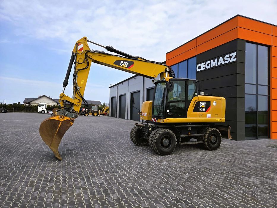Caterpillar M 318F / z Niemiec /  9300 mth /