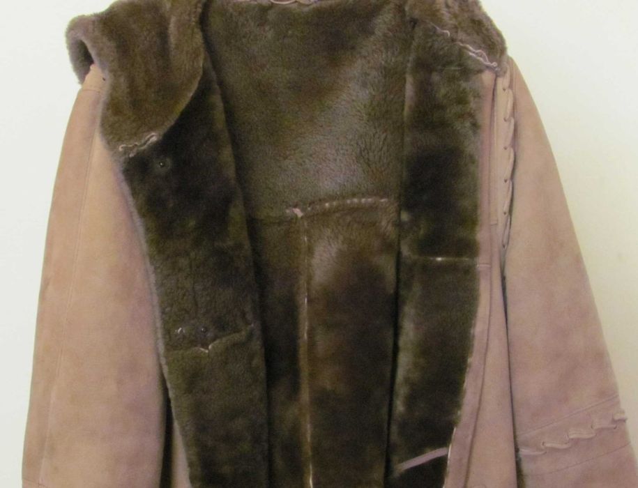 Casaco comprido em pele