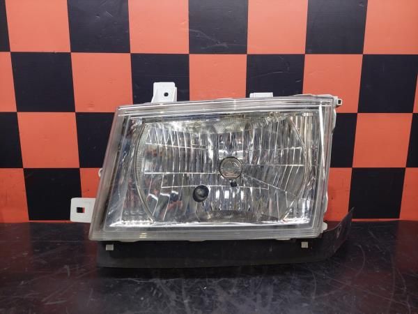 Ótica / farol esquerda MITSUBISHI TRUCKS Canter