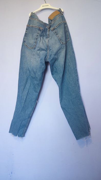 Широкі стильні джинси та рвані