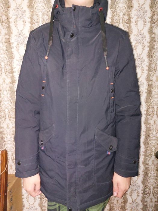 Продам зимнюю куртку на мальчика подростка. Размер  13-14 лет.