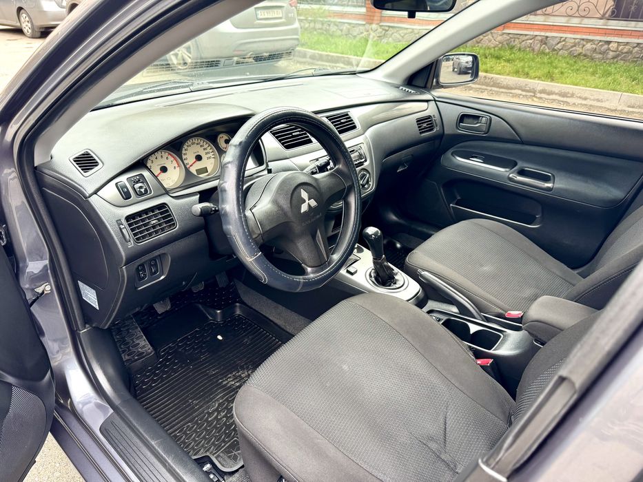 Продам Митсубиси Лансер