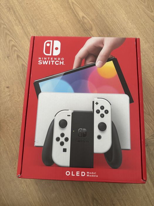 Nintendo switch oled + bolsa de transporte + jogo