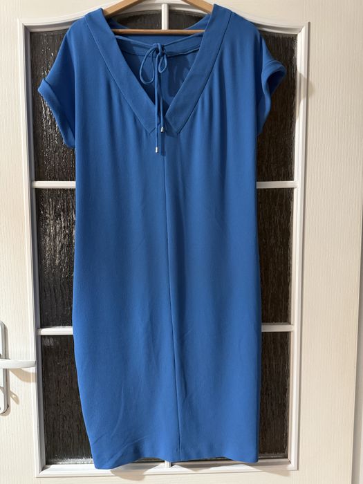 Niebieska sukienka chabrowa z kieszeniami elastyczny materiał 36 S