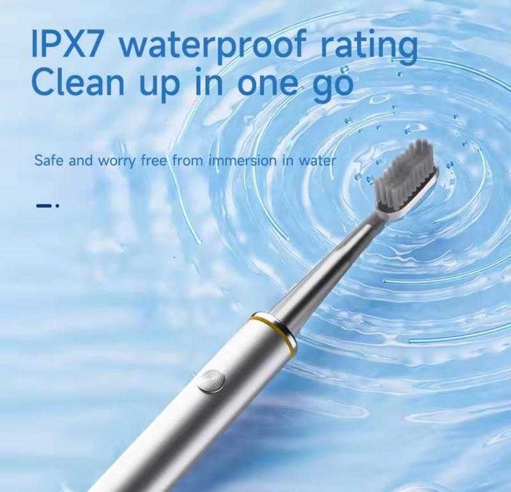 Електрична зубна щітка з USB зарядкою та 4 додатковими насадками .
