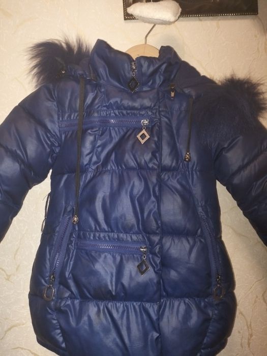 Курточка пуховик подовженого типу. 
Довжина 55
Рукав 40(відгорнутий)
П