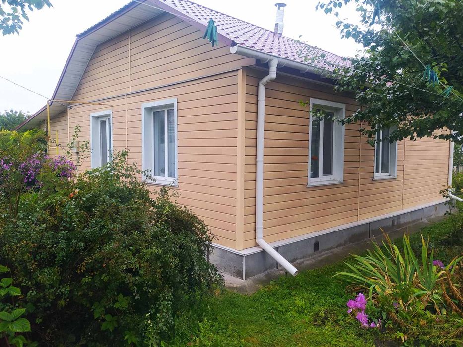 Будинок з земельною ділянкою 21 сотка
