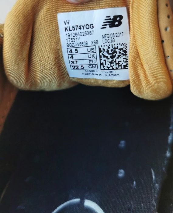 Ténis NB amarelo