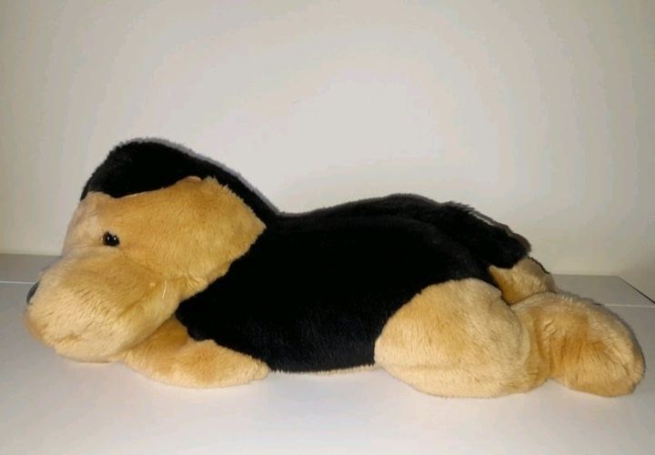cão de peluche de criança