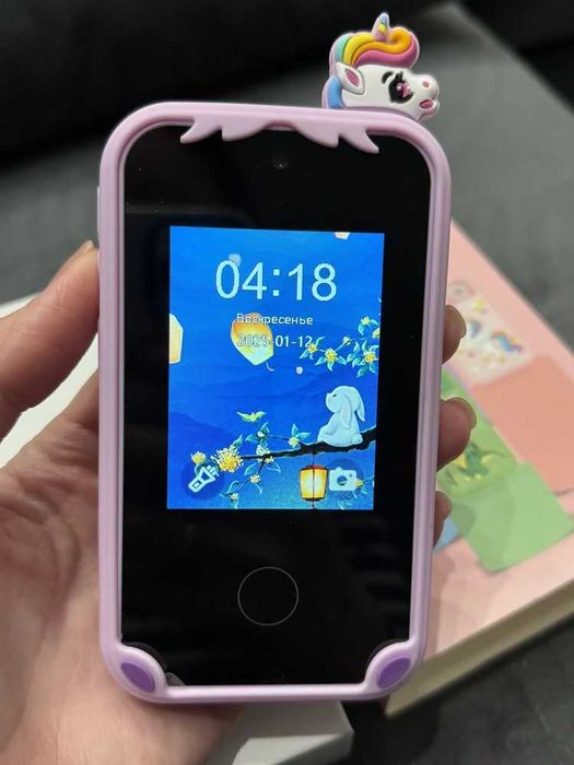 Дитячий телефон інтерактивний для розваг з іграми та фото