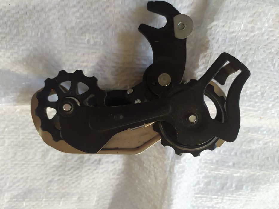 Задний переключатель скоростей, компаньела Shimano.