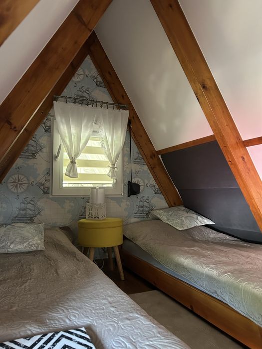 Domek nad jeziorem Warmia i Mazury łódka pomost