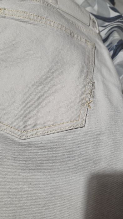 Jeansy białe damskie