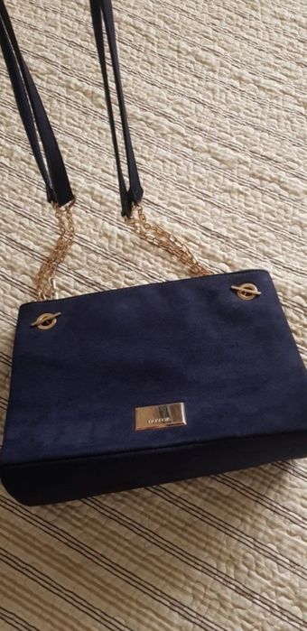 Mala parfois  azul escuro como  nova