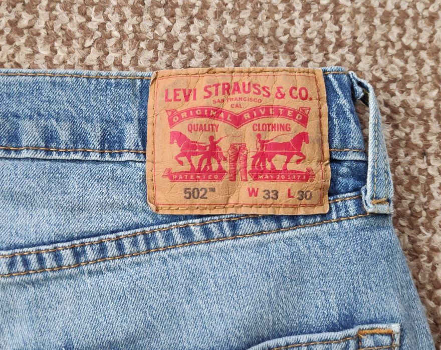 Levi's 502 джинси tapered fit оригінал W33 L30 блакитні