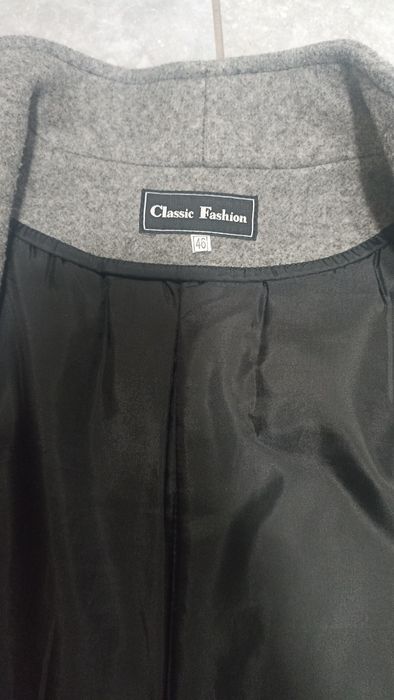 Пальто сірого кольору