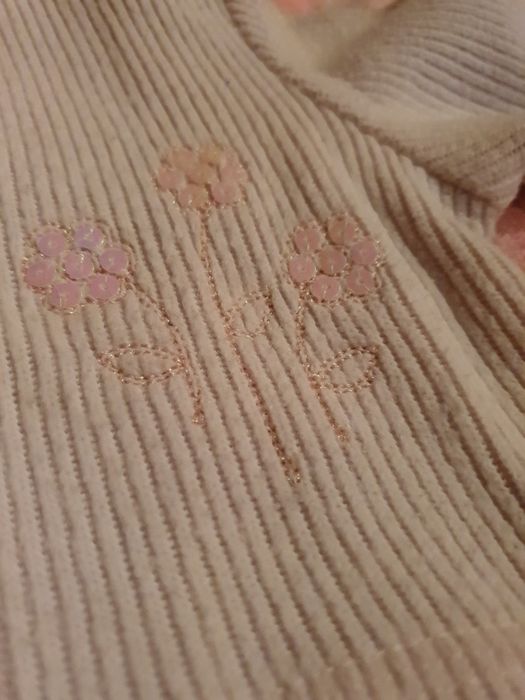 Bolerko beżowe z kwiatkiem