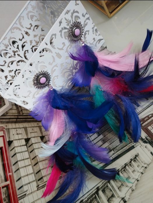 Kolczyki ze słońcem i piórami kolorowe