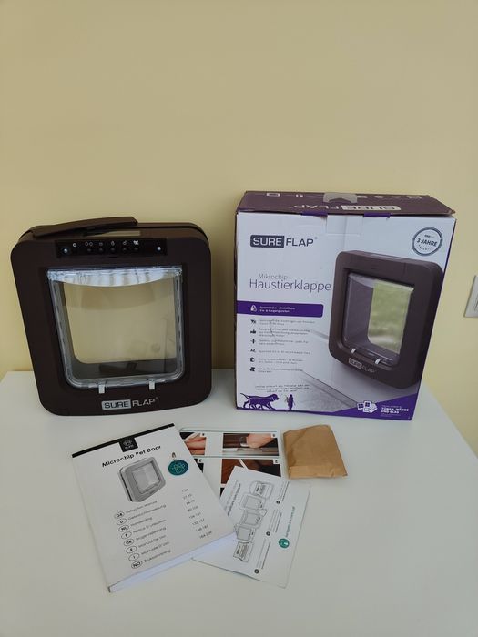 Surefeed, sureflap, розумні двері для котів, собак