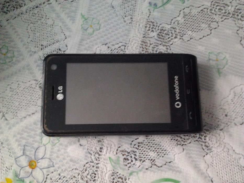 Телефон LG KU990i